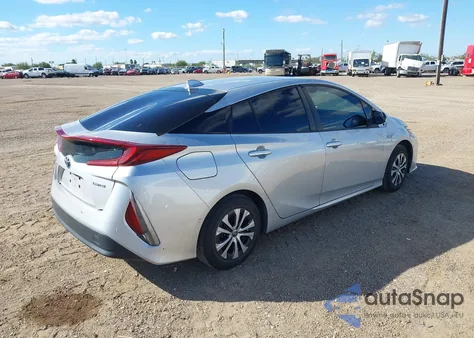 2022 Toyota Prius Prime Limited z USA, uszkodzony, nr VIN JTDKAMFP0N3211769